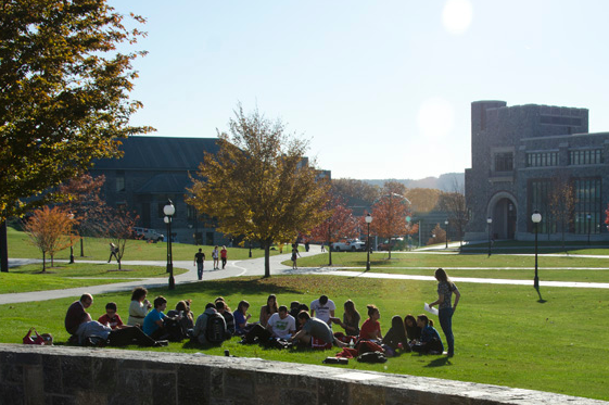 Students sitting outside in a group