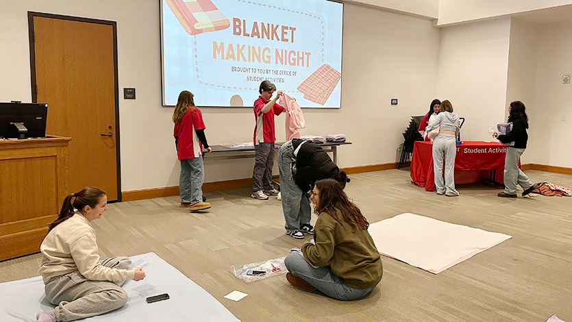 Marist University Image: Students prepare to make blankets.