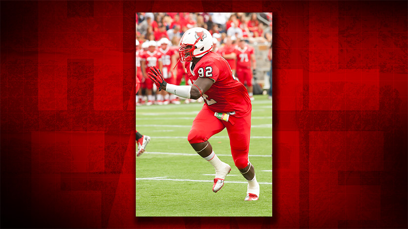 Image of Terrence Fede playing football for Marist University.